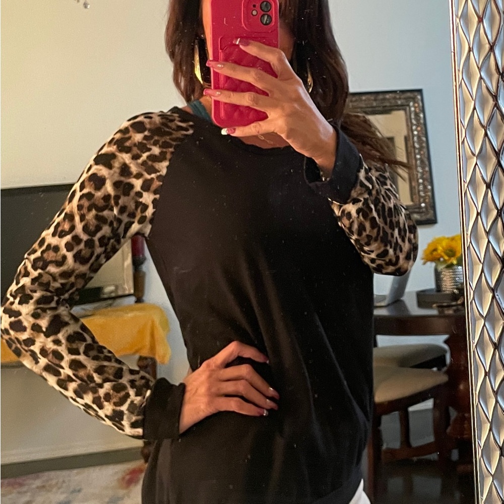 Tunic with leopard sleeves